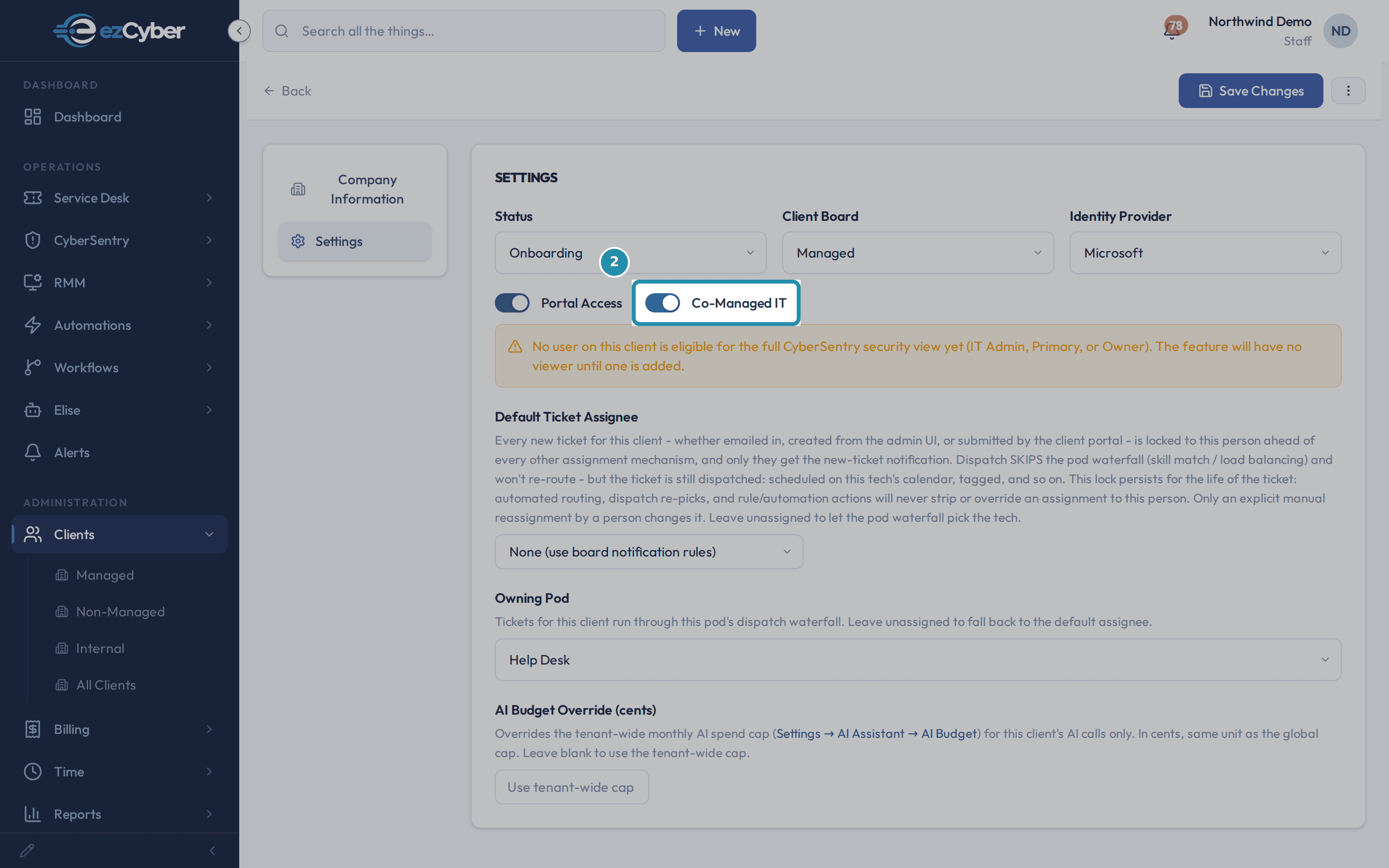 The client Settings tab with the Co-Managed IT toggle turned on, and a warning banner about eligible users below it.